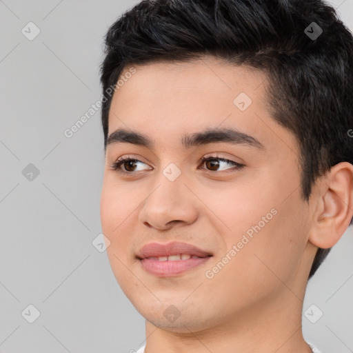 Joyful white young-adult male with short  black hair and brown eyes