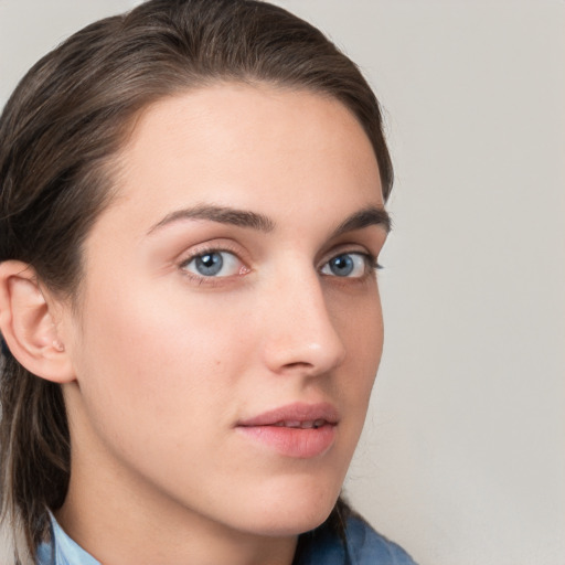 Neutral white young-adult female with medium  brown hair and grey eyes