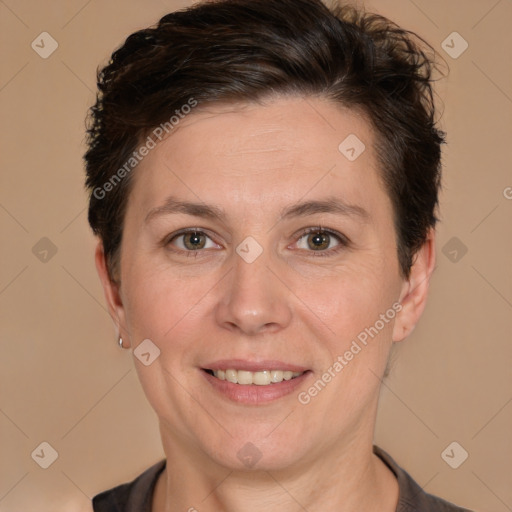 Joyful white adult female with short  brown hair and brown eyes