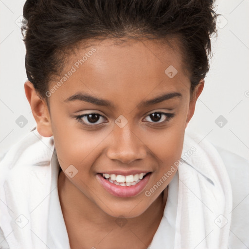 Joyful white child female with short  brown hair and brown eyes