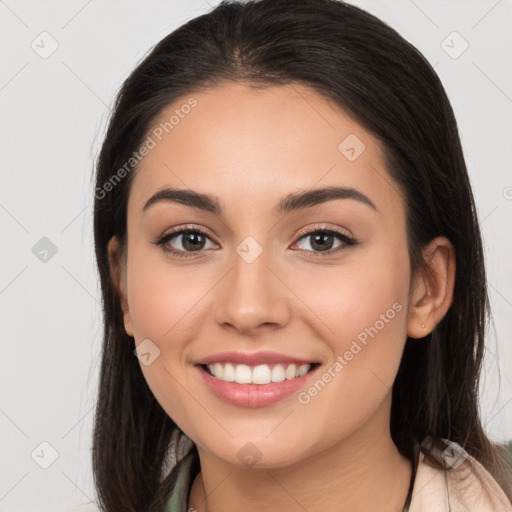 Joyful white young-adult female with long  brown hair and brown eyes