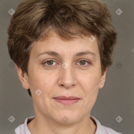 Joyful white adult female with short  brown hair and brown eyes