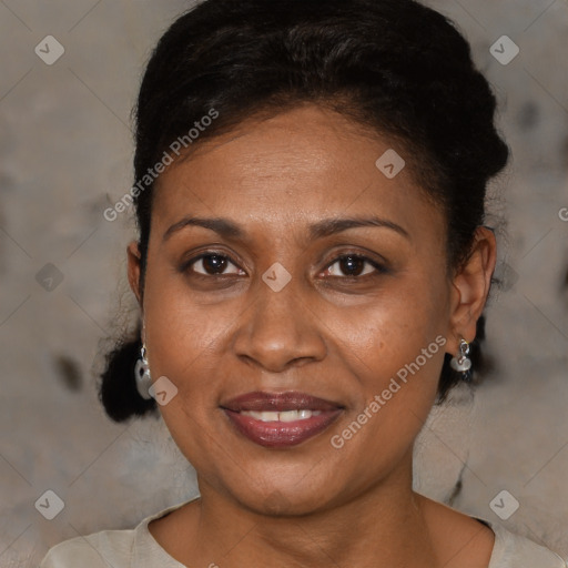 Joyful black adult female with short  brown hair and brown eyes