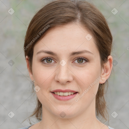 Joyful white young-adult female with medium  brown hair and green eyes