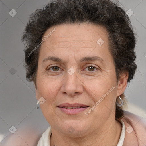 Joyful white adult female with short  brown hair and brown eyes