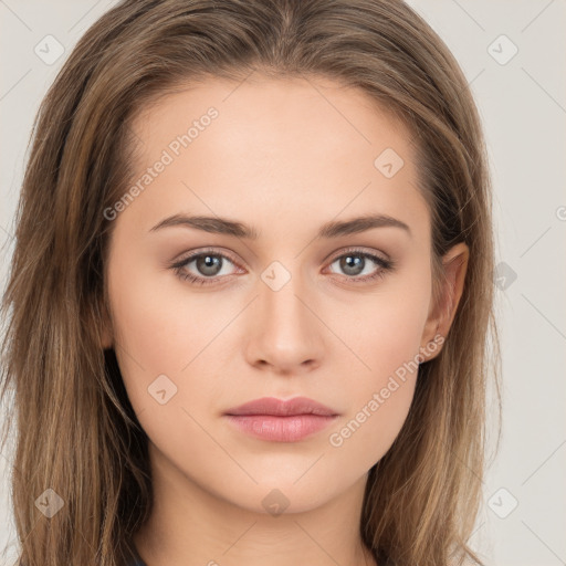 Neutral white young-adult female with long  brown hair and brown eyes