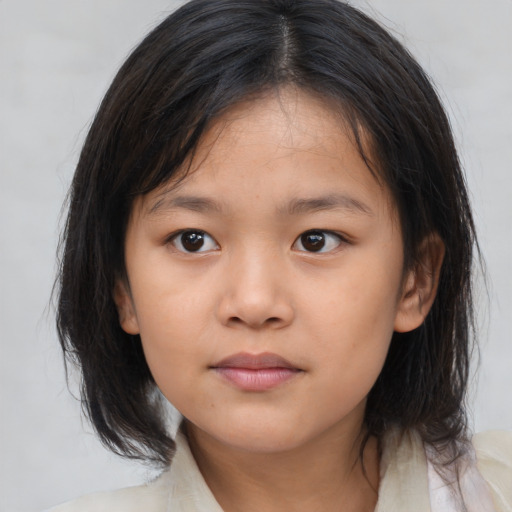 Neutral asian child female with medium  brown hair and brown eyes