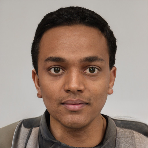 Neutral black young-adult male with short  black hair and brown eyes