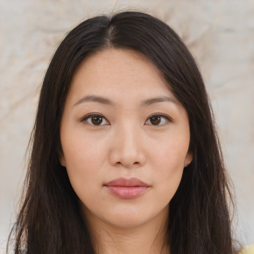 Neutral asian young-adult female with long  brown hair and brown eyes