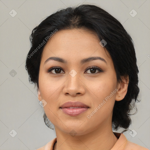 Joyful asian young-adult female with medium  black hair and brown eyes