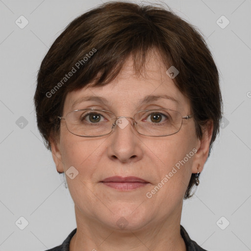 Joyful white adult female with short  brown hair and brown eyes