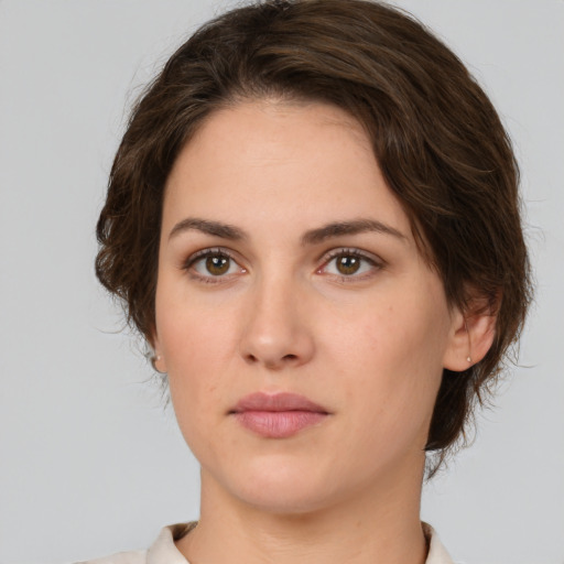 Neutral white young-adult female with medium  brown hair and brown eyes