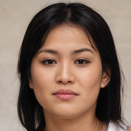Neutral asian young-adult female with medium  black hair and brown eyes