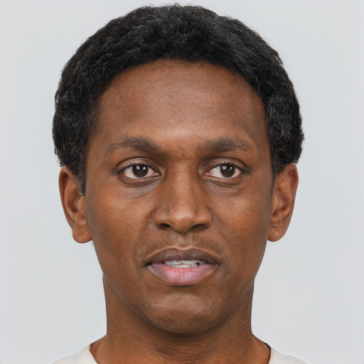Neutral black adult male with short  black hair and brown eyes