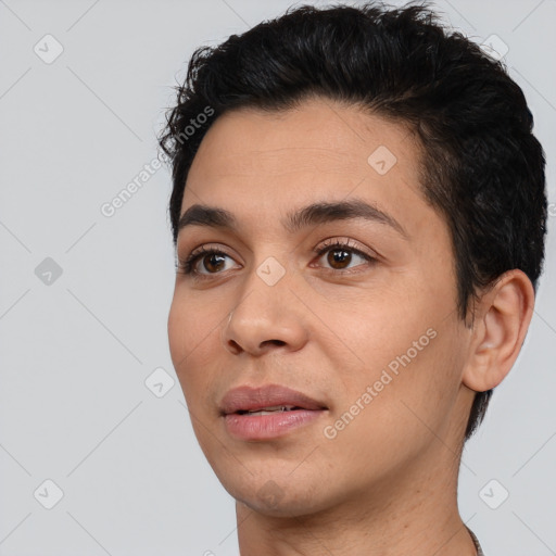 Joyful white young-adult male with short  black hair and brown eyes