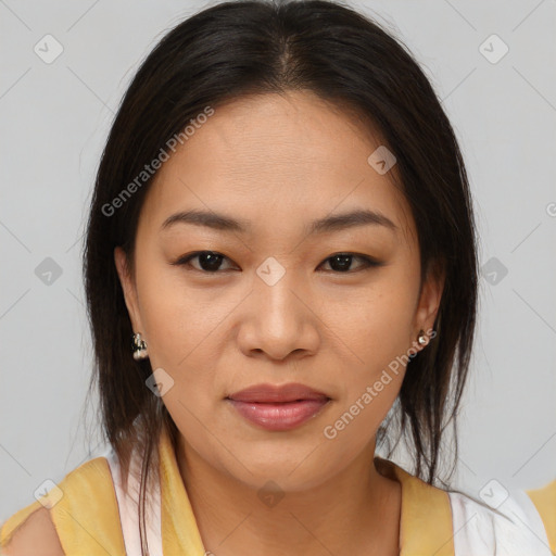 Joyful asian young-adult female with medium  brown hair and brown eyes