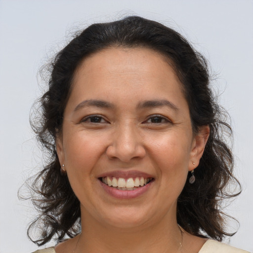 Joyful asian adult female with medium  brown hair and brown eyes