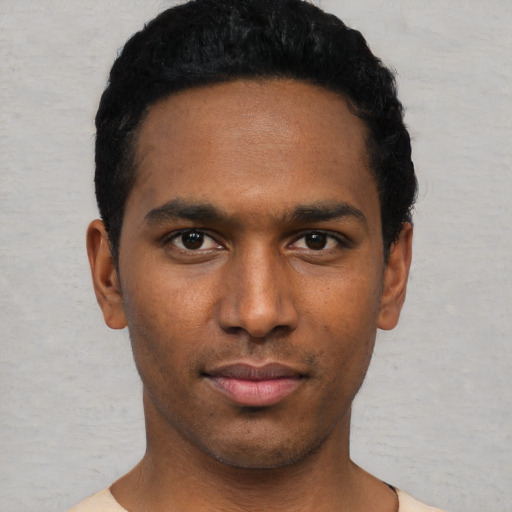 Neutral black young-adult male with short  black hair and brown eyes