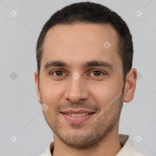 Joyful white young-adult male with short  brown hair and brown eyes