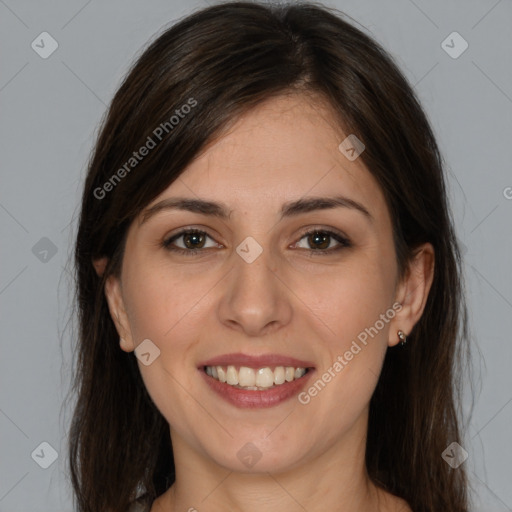 Joyful white young-adult female with medium  brown hair and brown eyes