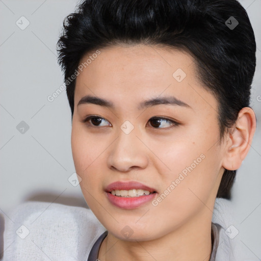 Joyful asian young-adult female with short  black hair and brown eyes