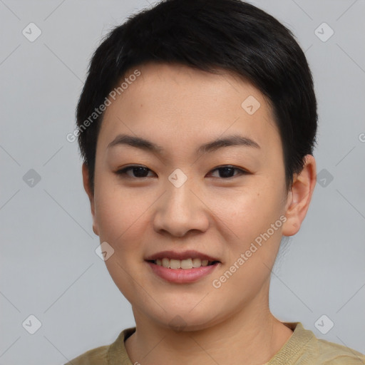 Joyful asian young-adult female with short  black hair and brown eyes