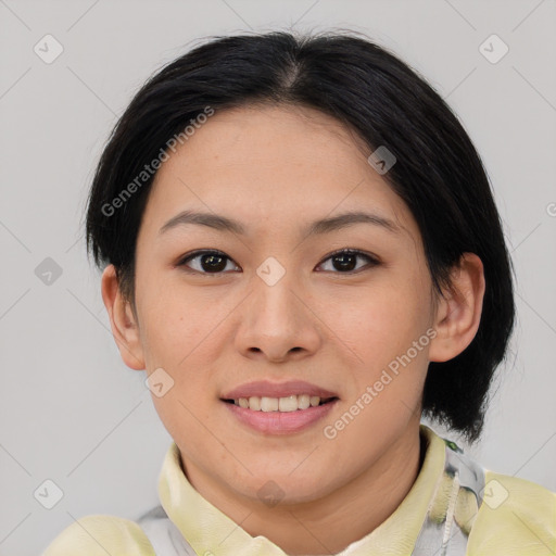 Joyful asian young-adult female with medium  brown hair and brown eyes