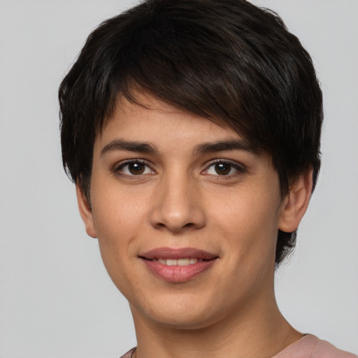 Joyful white young-adult female with short  brown hair and brown eyes