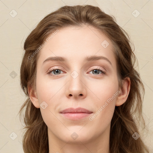 Joyful white young-adult female with long  brown hair and green eyes