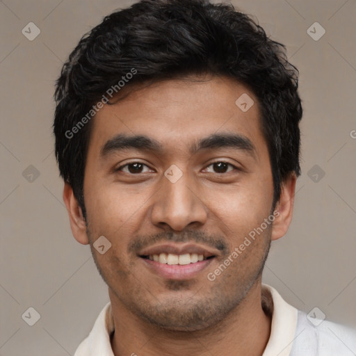 Joyful latino young-adult male with short  black hair and brown eyes