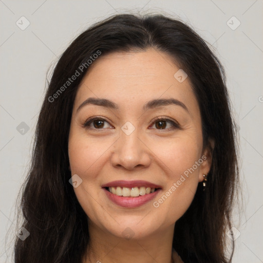 Joyful asian young-adult female with long  brown hair and brown eyes