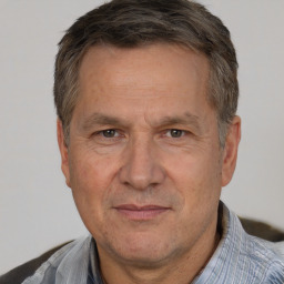 Joyful white middle-aged male with short  brown hair and brown eyes