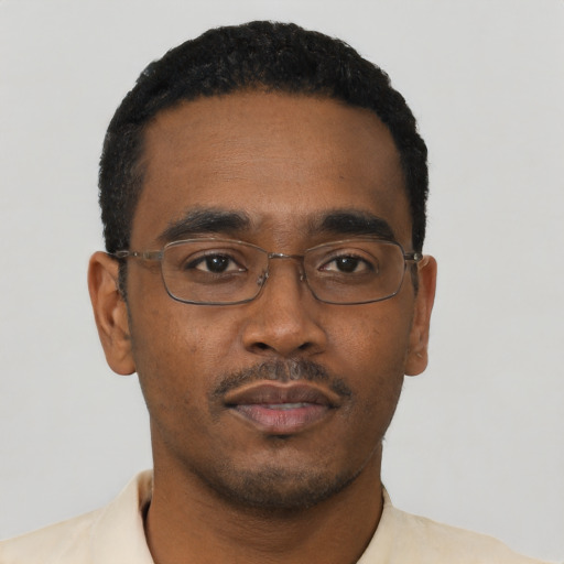 Neutral black young-adult male with short  brown hair and brown eyes