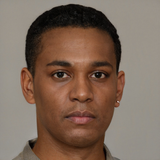Neutral black young-adult male with short  brown hair and brown eyes