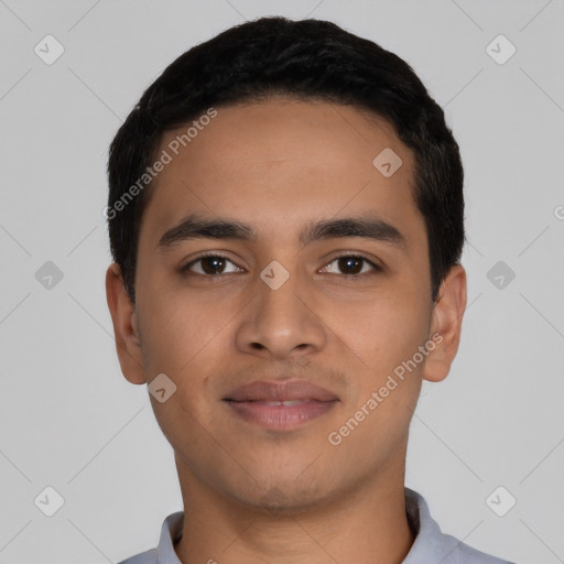 Joyful latino young-adult male with short  black hair and brown eyes