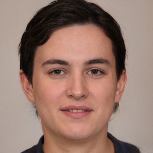 Joyful white young-adult male with medium  brown hair and brown eyes