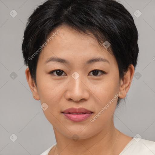 Joyful asian young-adult female with short  brown hair and brown eyes