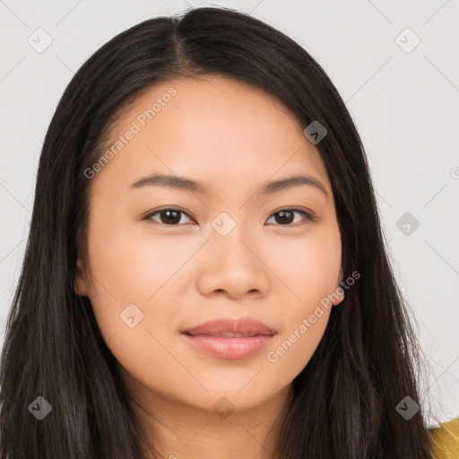 Joyful asian young-adult female with long  brown hair and brown eyes