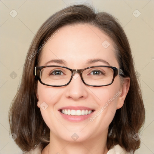 Joyful white young-adult female with medium  brown hair and blue eyes