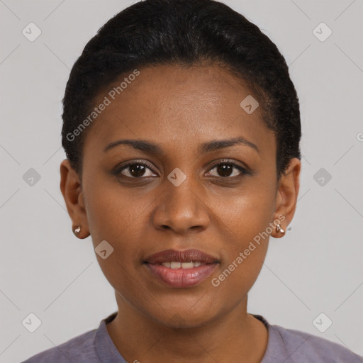 Joyful black young-adult female with short  brown hair and brown eyes