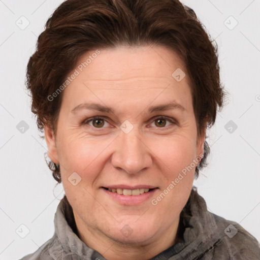 Joyful white adult female with short  brown hair and grey eyes