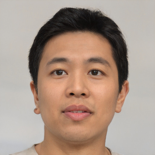 Neutral asian young-adult male with short  black hair and brown eyes