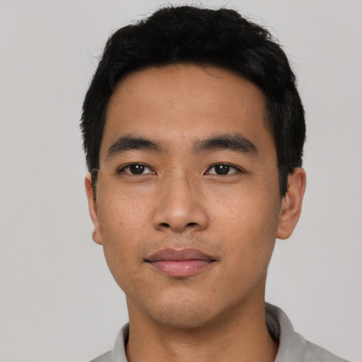 Neutral asian young-adult male with short  black hair and brown eyes