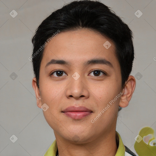 Joyful asian young-adult male with short  brown hair and brown eyes