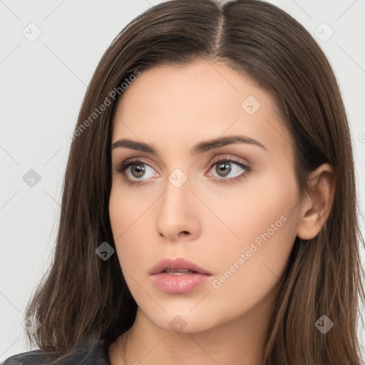 Neutral white young-adult female with long  brown hair and brown eyes