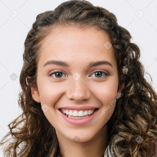 Joyful white young-adult female with long  brown hair and green eyes