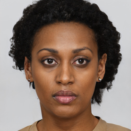 Neutral black young-adult female with short  black hair and brown eyes