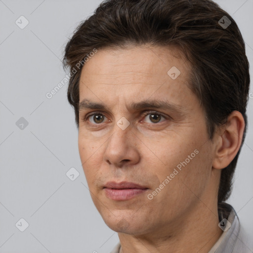 Neutral white adult male with short  brown hair and brown eyes