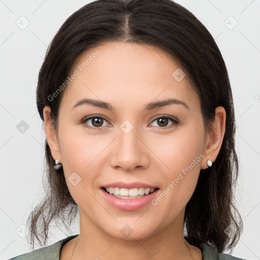 Joyful white young-adult female with medium  brown hair and brown eyes