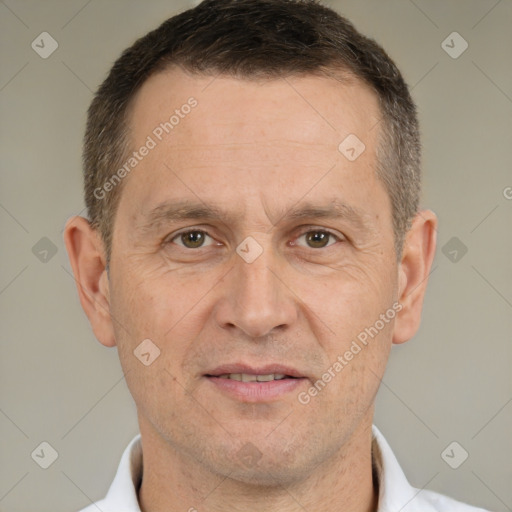 Joyful white adult male with short  brown hair and brown eyes